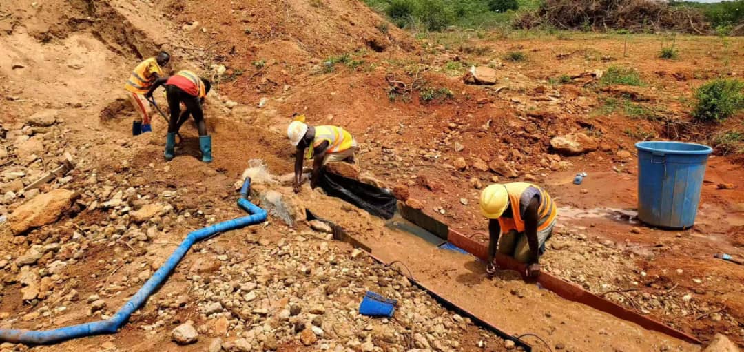 JUKRIS Mining workers at an active mining site in Tanzania